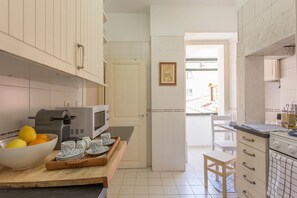 Fridge, microwave, oven, coffee/tea maker - Spacious Alfama Duplex, by TimeCooler (Lisboa)