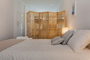 2 habitaciones, tabla de planchar con plancha, wifi y ropa de cama 