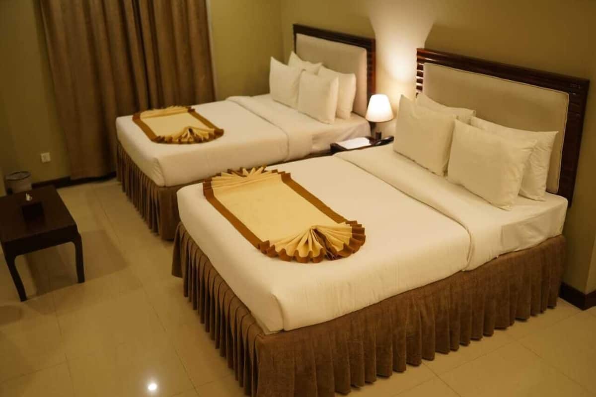 Executive Suite | Copriletto in piuma, materassi a doppio strato, minibar