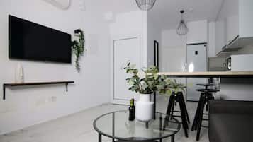 Apartemen Junior | Area keluarga | TV layar datar