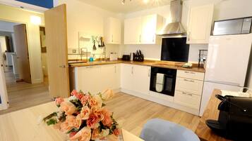 Premier Apartment, 2 Bedrooms | Private kitchen | Toaster, coffee grinder, cleaning supplies, freezer