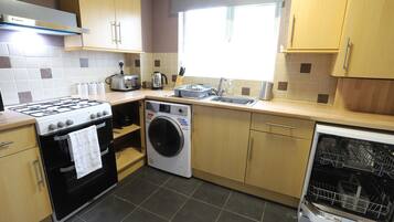 Toaster, coffee grinder, cleaning supplies, freezer