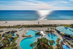 A resort with multiple swimming pools, a beach, and a view of the ocean. - Edgewater by iTrip Panama City Beach (Panama City Beach)