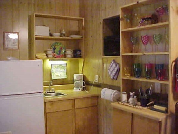 Fridge, microwave, coffee/tea maker, toaster