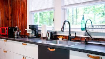 Fridge, microwave, stovetop, coffee/tea maker