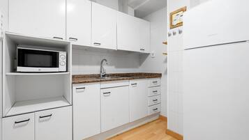 Fridge, microwave, coffee/tea maker, toaster