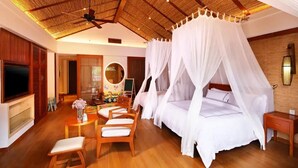 A bedroom with a canopy bed, wooden furniture, a TV, and a mirror. - Crosswaters Ecolodge & Spa (Huizhou)