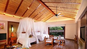 A bedroom with a canopy bed, a wooden ceiling, a TV, and a balcony with a view. - Crosswaters Ecolodge & Spa (Huizhou)