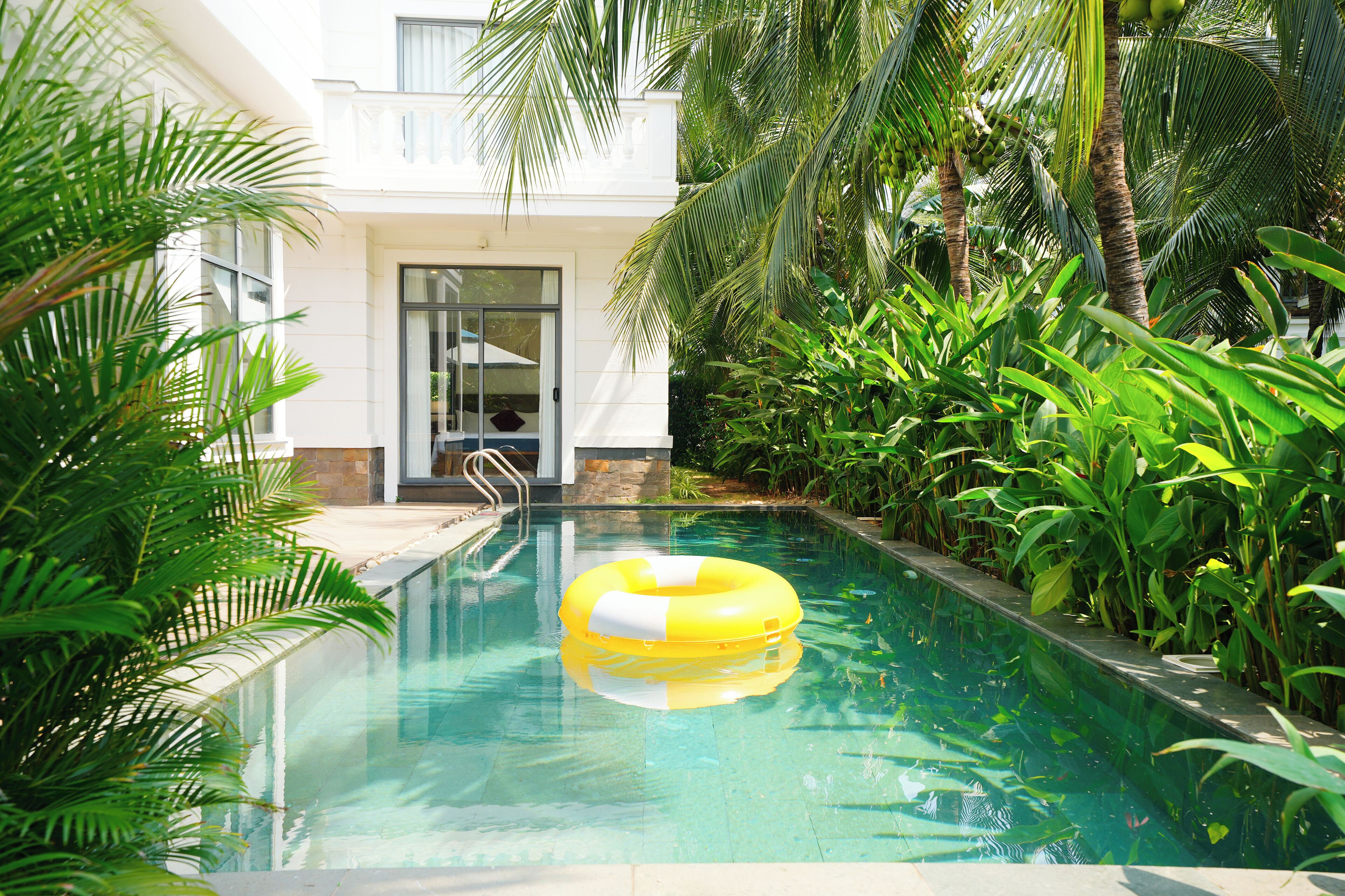 Outdoor pool, open 6:00 AM to 10:00 PM, sun loungers