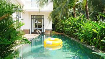 Outdoor pool, open 6:00 AM to 10:00 PM, sun loungers