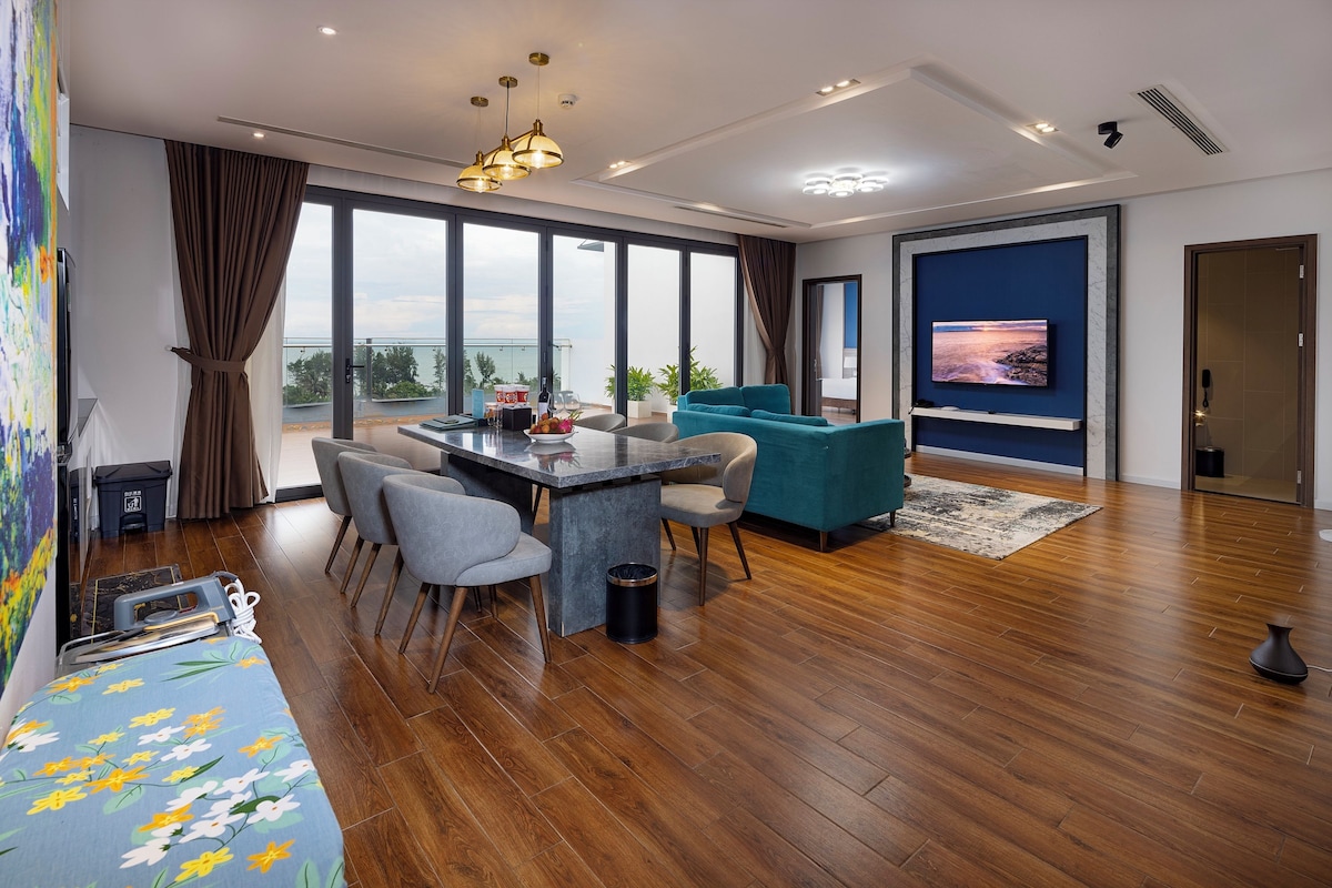 Penthouse, Beach View | Living area | 50-inch Smart TV with cable channels, TV