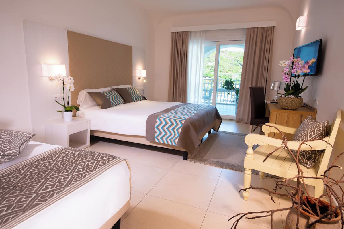 Deluxe Triple Room, Sea View | Terrace/patio