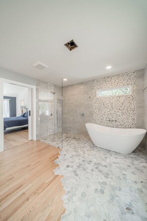 Bathtub, hair dryer, towels