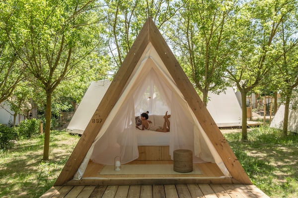 Tent | Hypo-allergenic bedding, down comforters, memory foam beds, in-room safe