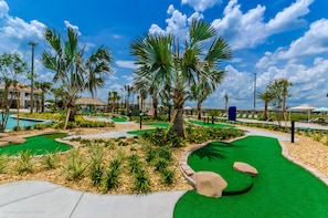 Enjoy a round of golf amidst lush green spaces and tropical surroundings.