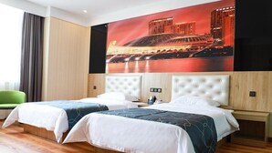 A hotel room with two beds, a large wall mural, wooden paneling, and a green chair. - Chonpines Hotel (Zhengzhou)