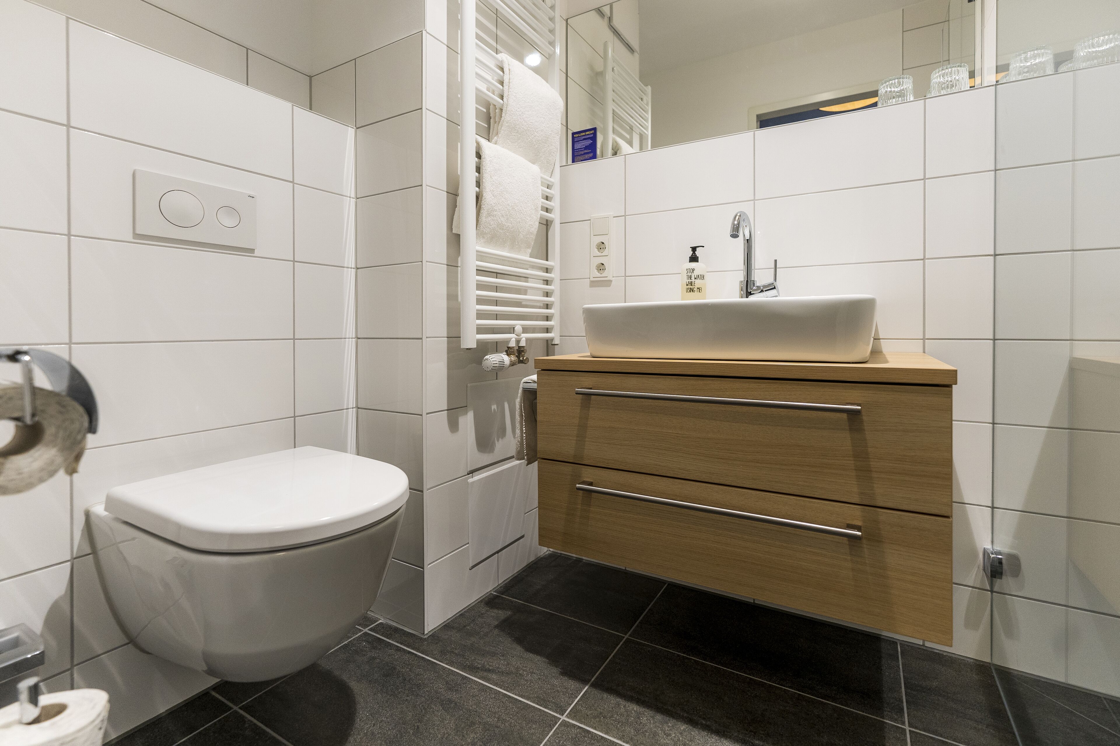 superior double room | bathroom | shower, hair dryer, towels