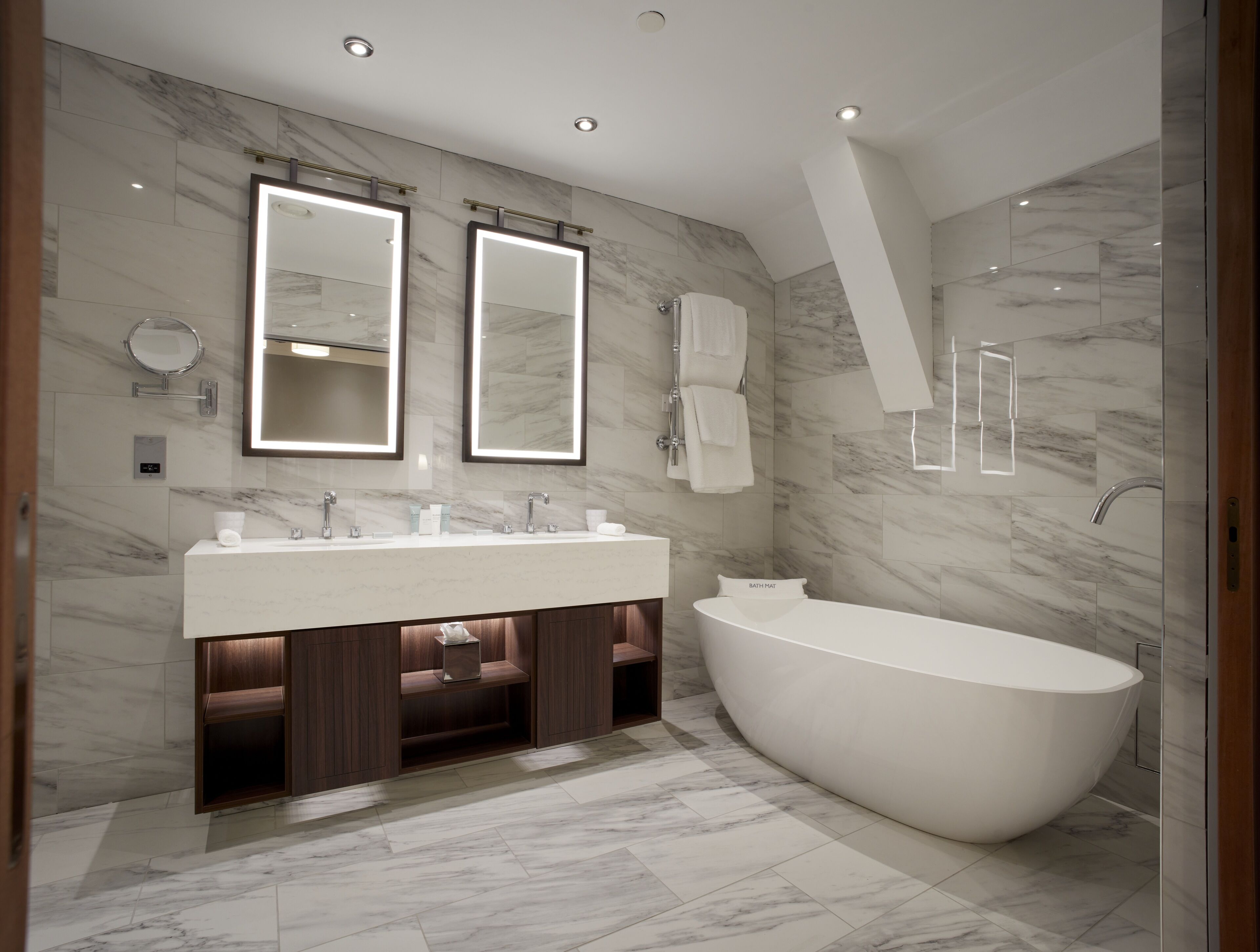 luxury suite | bathroom | hair dryer, towels