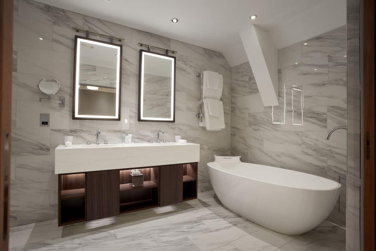 luxury suite | bathroom | hair dryer, towels