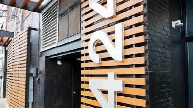A building facade with a large sign reading "Gold Way." - 3E-Spacious close to PITT/CMU/Carlow, Sleeps 4 (Pittsburgh)