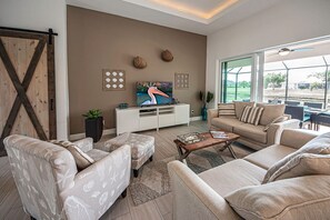 Casa (Pelican Shores) | Sala de estar | Televisión de pantalla plana y reproductor de DVD 