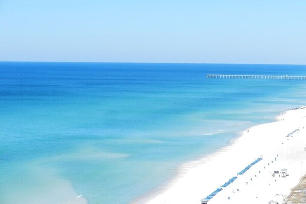On the beach, sun-loungers, beach towels