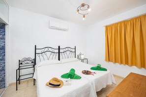 2 habitaciones, tabla de planchar con plancha, wifi y ropa de cama 