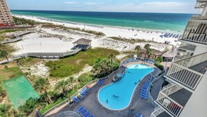 A resort with a swimming pool, beach access, and a view of the ocean. - Pelican Beach 814 — 8th-Floor Oceanfront 2BR Condo in Destin (Destin)
