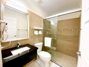 Shower, hair dryer, towels, soap