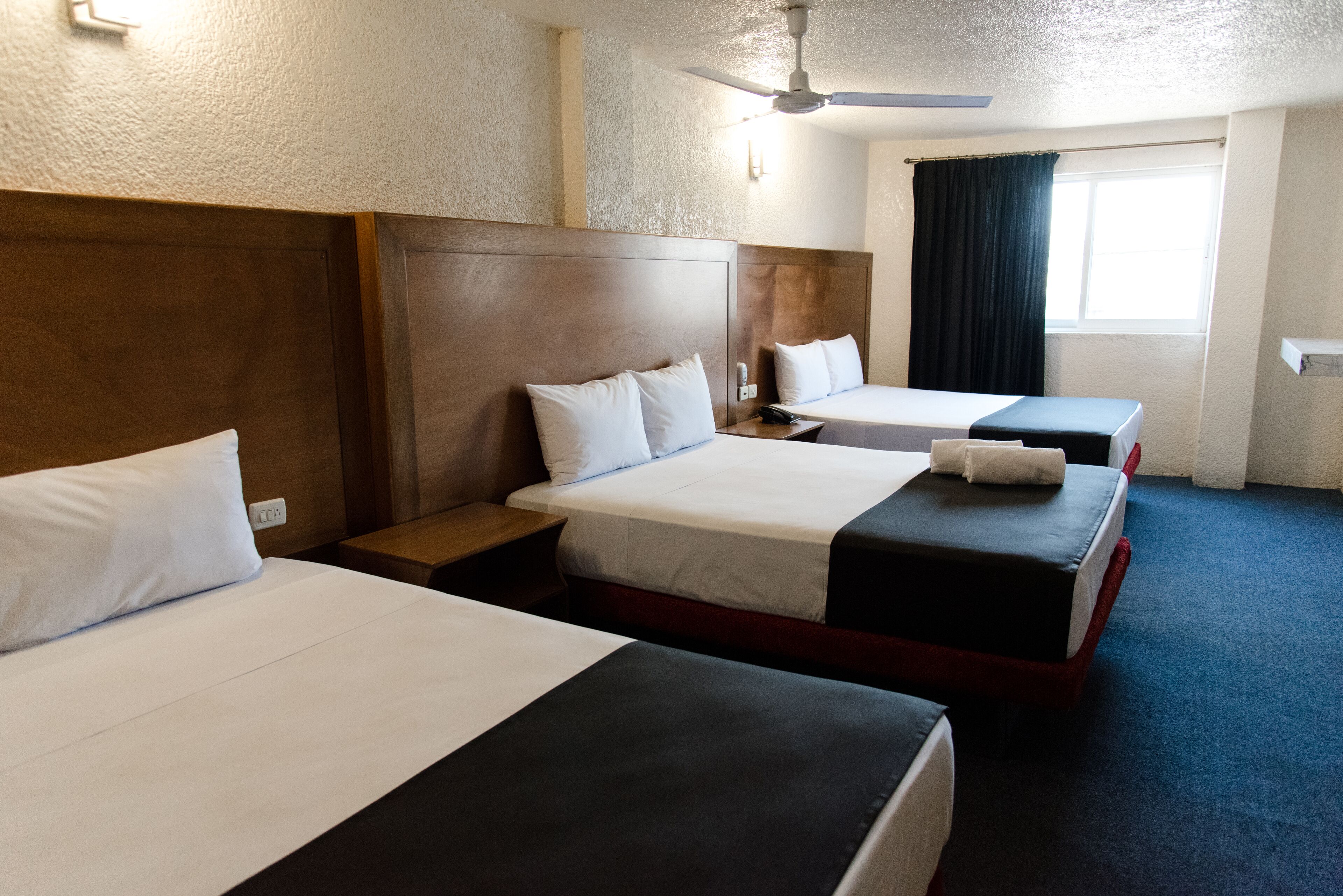 Grand Triple Room | Desk, free WiFi, bed sheets