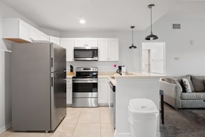 Fridge, microwave, oven, stovetop - 🏖️ Madeira Bay Resort I #1401 – Spacious, Stylish & Pet-Free (Madeira Beach)