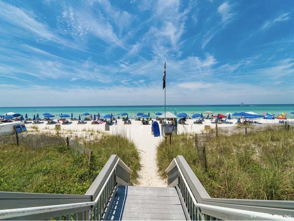 On the beach, sun loungers, beach towels