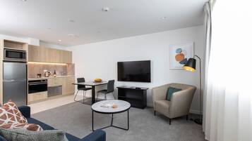 Classic-Apartment | Wohnbereich | Fernseher