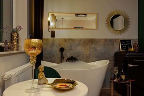 Bathtub, hair dryer, towels