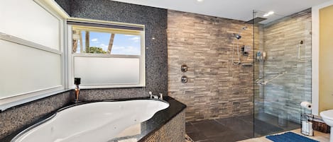 Bathtub, jetted tub, hair dryer, towels