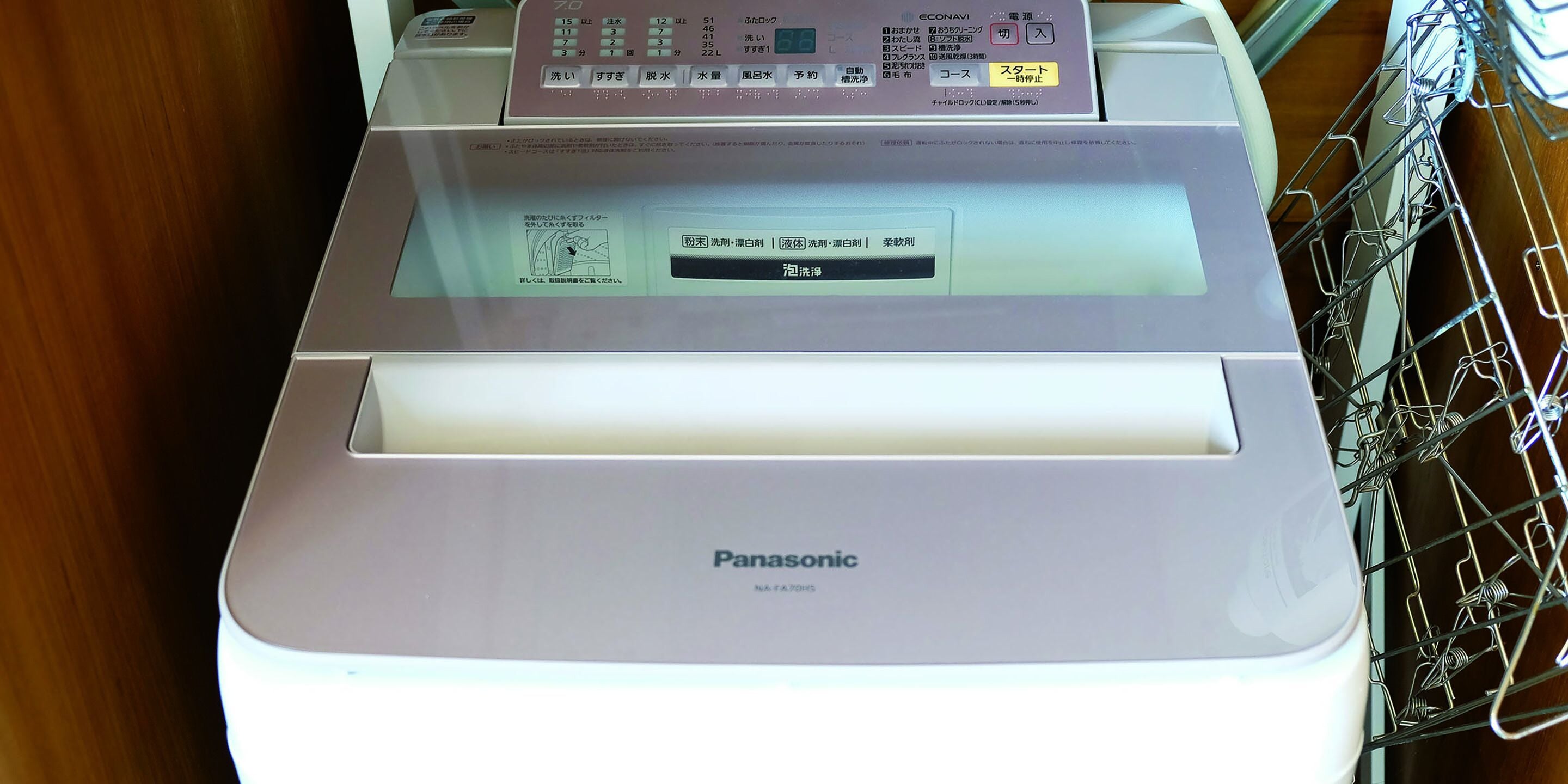 A Panasonic dishwasher with a control panel displaying various settings and options.