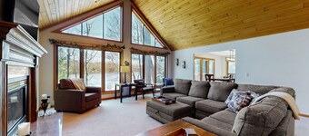 Dog-friendly lodging w/ scenic deck, pool table, lake dock, & free WiFi