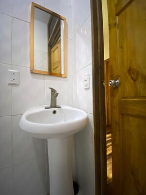Shower, towels, soap, toilet paper