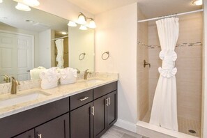 Bathtub, hair dryer, towels, soap