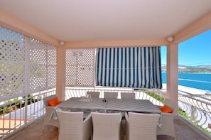 Outdoor dining - D large apt with big terrace, next to the beach (Arbanija)