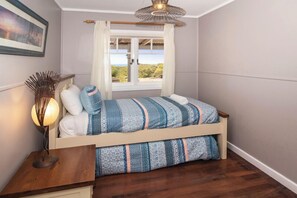 4 habitaciones, tabla de planchar con plancha y acceso a internet 