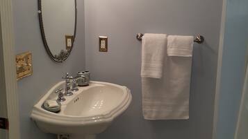 Combined shower/tub, hair dryer, towels, soap