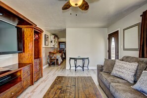 TV, fireplace, books