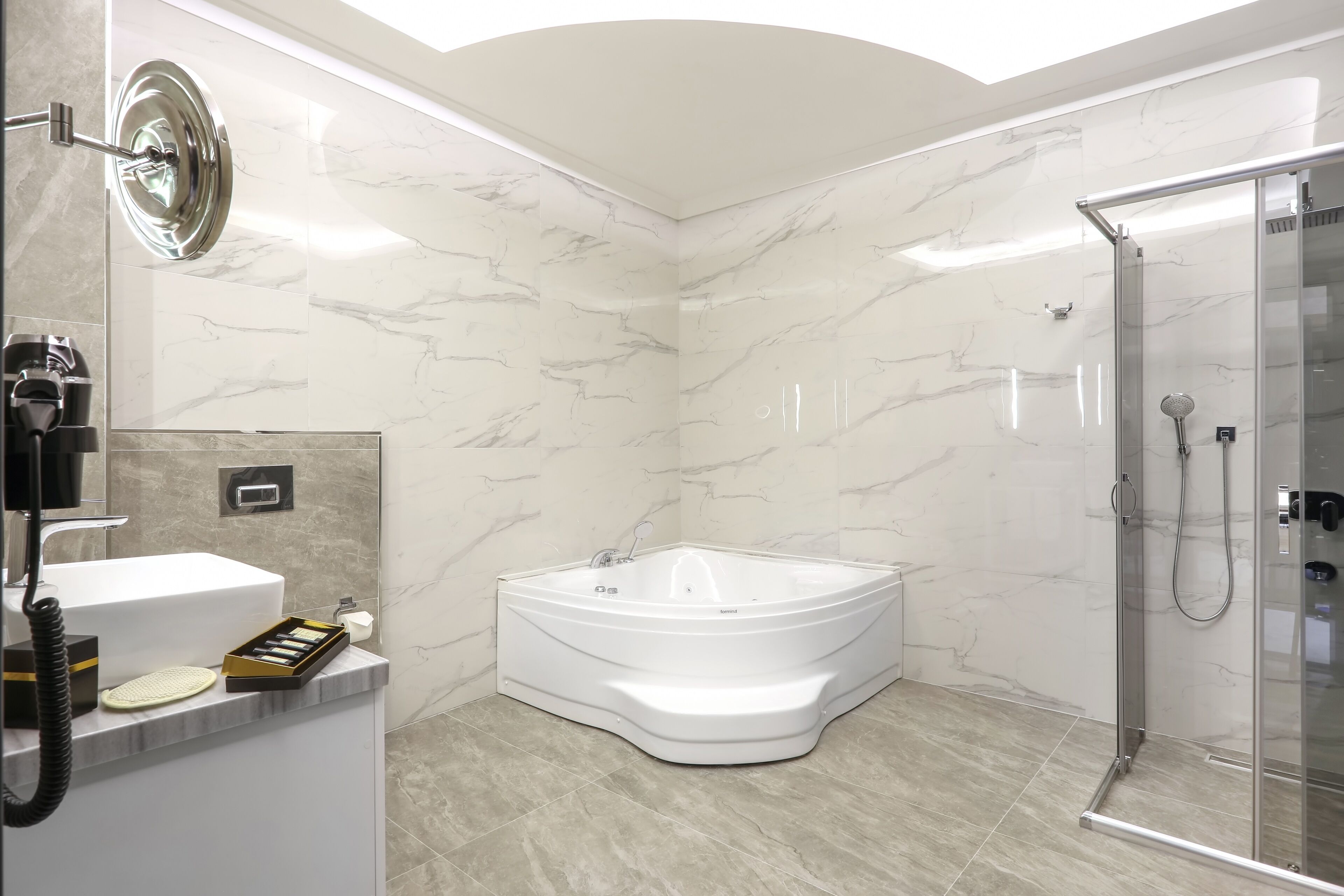 suite | bathroom | shower, rainfall showerhead, hair dryer, bathrobes