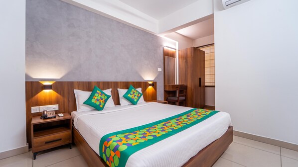 Deluxe Suite with Living Room | Desk, iron/ironing board, free WiFi, bed sheets - Treebo Petals Suites Marine Drive (Kanayannur)