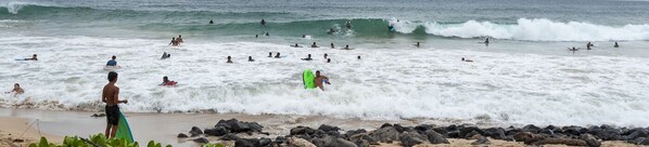 A beach with people surfing and swimming. - AC, Pool, Hot Tub, Tennis Courts! Short Walk to Poipu Beach & Restaurants (Koloa)
