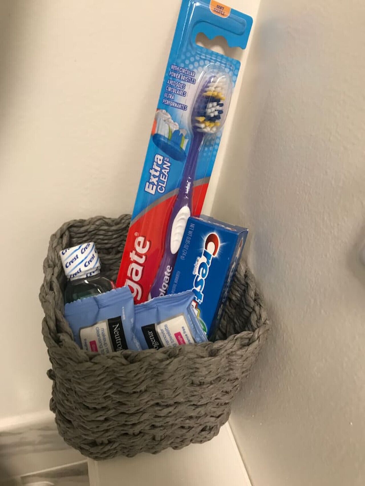 A basket containing Crest toothpaste, Crest mouthwash, Crest mouthwash, Crest mouthwash, Crest mouthwash, Crest mouthwash, Crest mouthwash, Crest mouthwash, Crest mouthwash, Crest mouthwash, Crest mouthwash, Crest mouthwash, Crest mouthwash, Crest mouthwash, Crest mouthwash, Crest mouthwash, Crest mouthwash, Crest mouthwash, Crest mouthwash, Crest mouthwash, Crest mouthwash, Crest mouthwash, Crest mouthwash, Crest mouthwash, Crest mouthwash, Crest mouthwash, Crest mouthwash, Crest mouthwash, Crest mouthwash, Crest mouthwash, Crest mouthwash, Crest mouthwash, Crest mouthwash, Crest mouthwash, Crest mouthwash, Crest mouthwash, Crest mouthwash, Crest mouthwash, Crest mouthwash, Crest mouthwash, Crest mouthwash, Crest mouthwash, Crest mouthwash, Crest mouthwash, Crest mouthwash, Crest mouthwash, Crest mouthwash, Crest mouthwash, Crest mouthwash