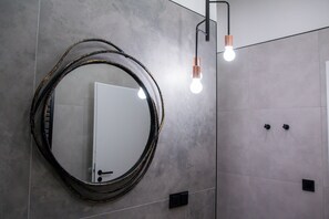 Exclusive Apartment | Bathroom | Shower, hair dryer, soap, toilet paper