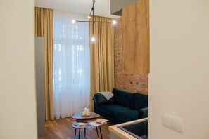 City Apartment | Living area | Flat-screen TV