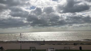 On the beach, sun-loungers
